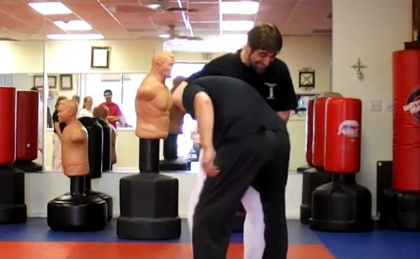 Pressure point escape from guillotine choke